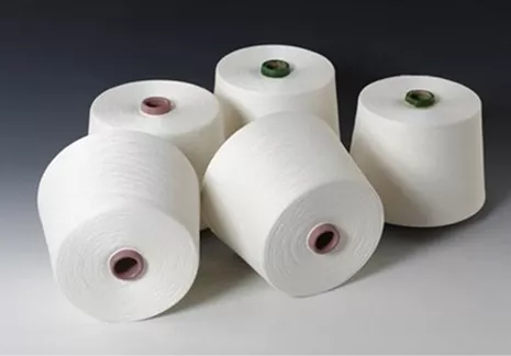 Polyester spun yarn for continuous textile production