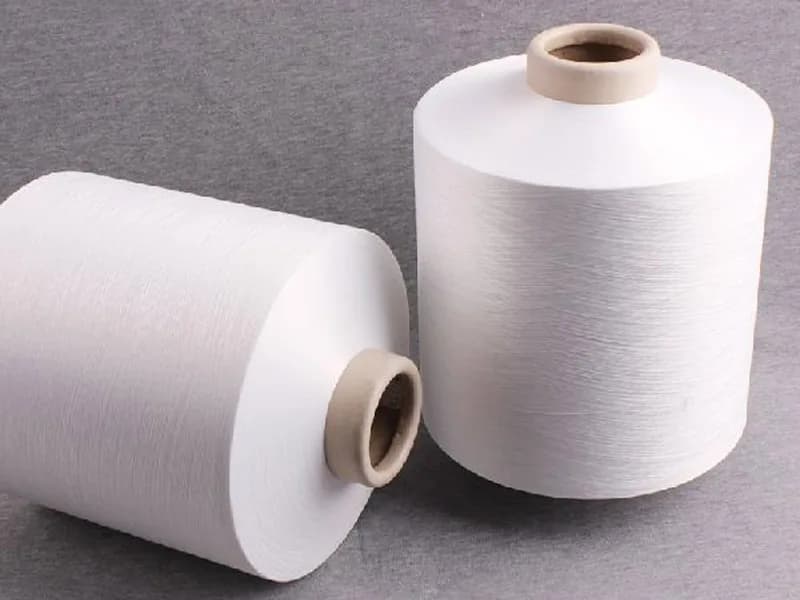 Texturised yarn produced through renewable-energy-supported manufacturing